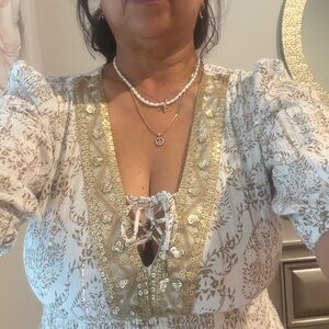 Elegant White and Gold Floral Dress